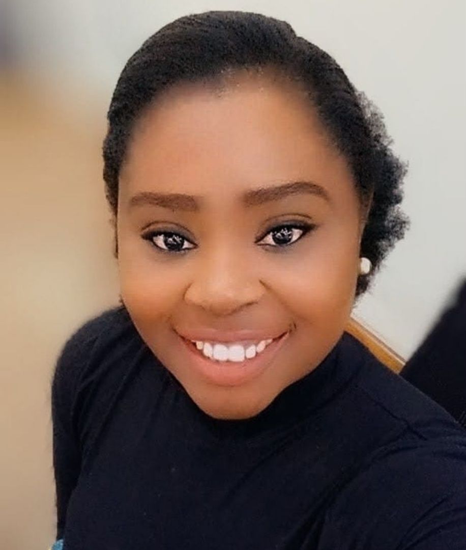 Portrait of Jessica Adeoye, interior design consultant, smiling